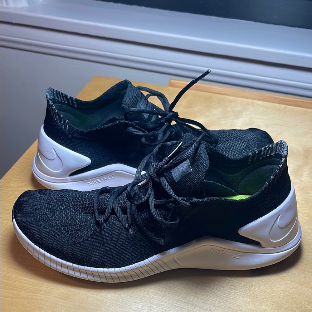 Women’s Black and White Nike Sneakers